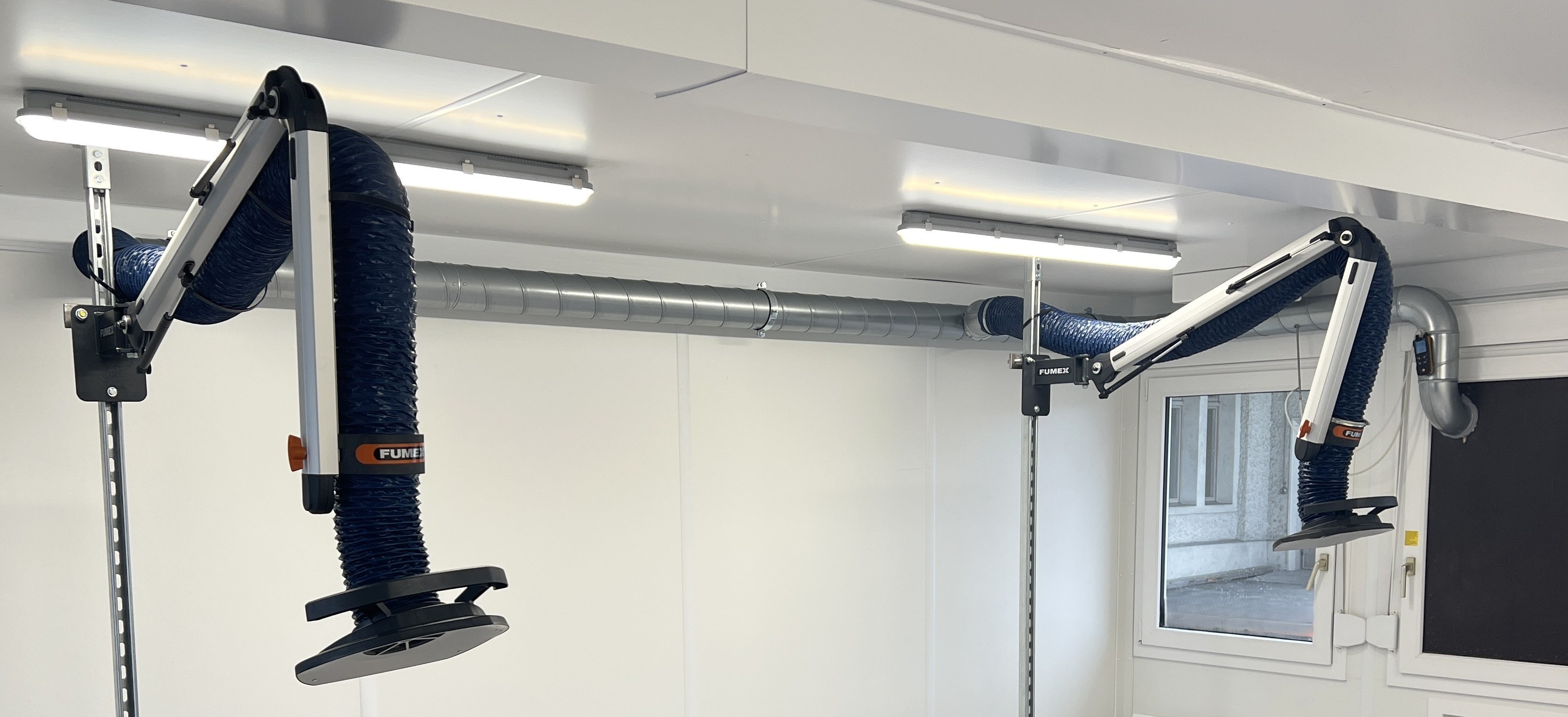 Extraction arms for carbon sanding dust, research